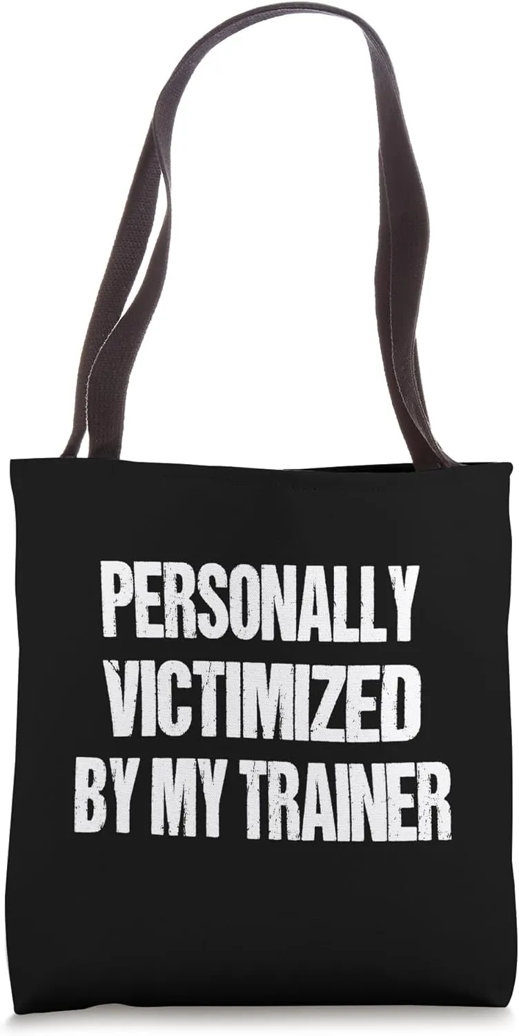 Funny Gym Personally Victimized By My Trainer Weightlifting Tote Bag