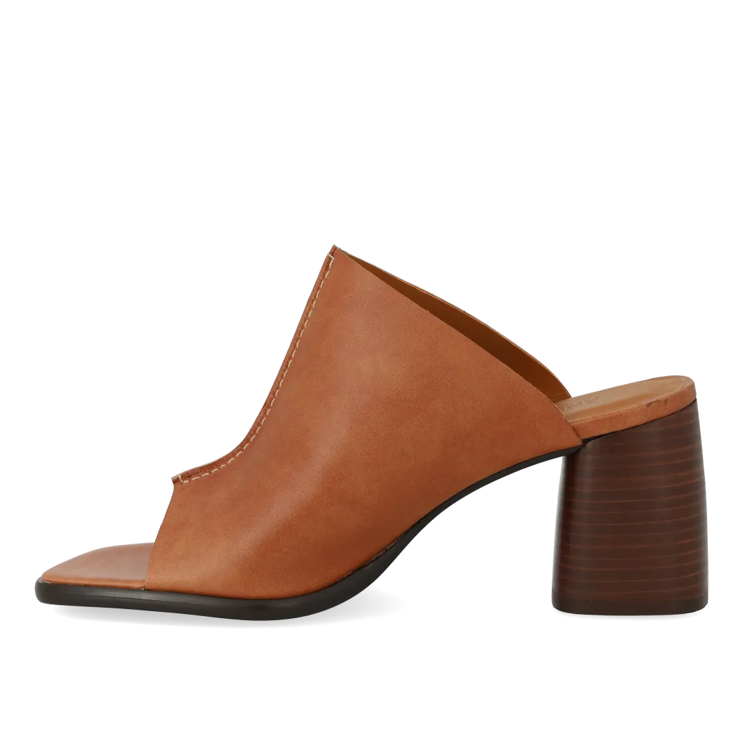 Mule with sculptural heel