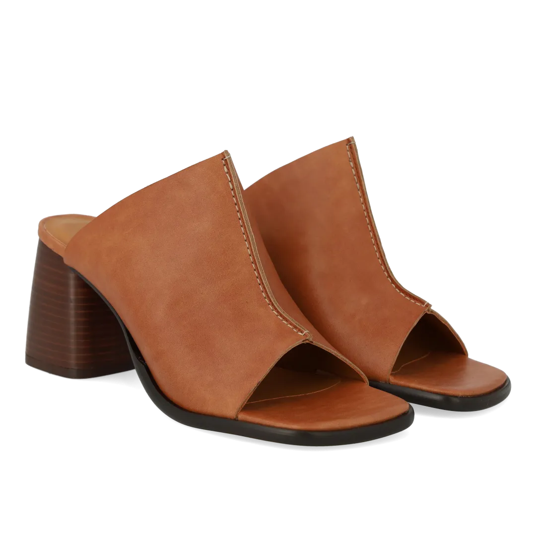 Mule with sculptural heel