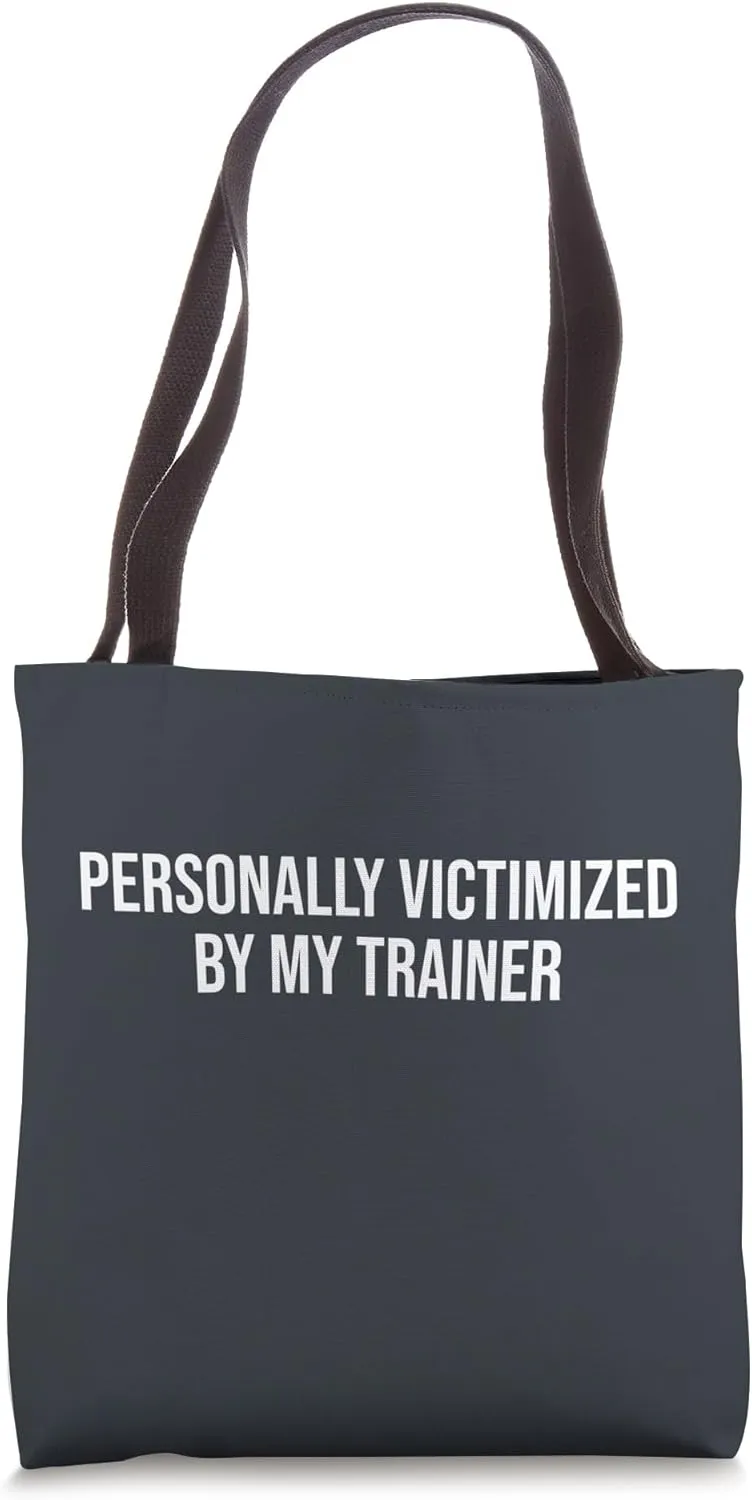 Personally Victimized By My Trainer Funny Workout Tote Bag